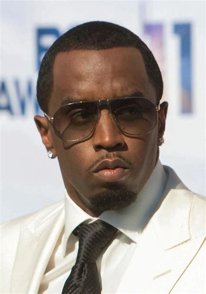 Elegance Personified: Diddy in White Suit