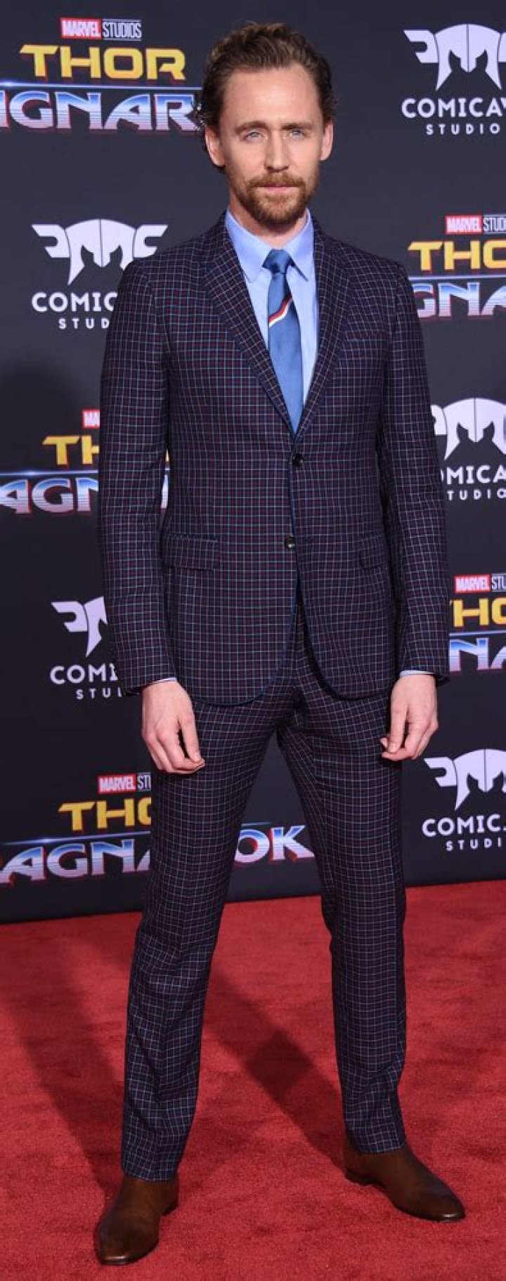 Unveiling the Height of Tom Hiddleston: How Tall is He in Feet?